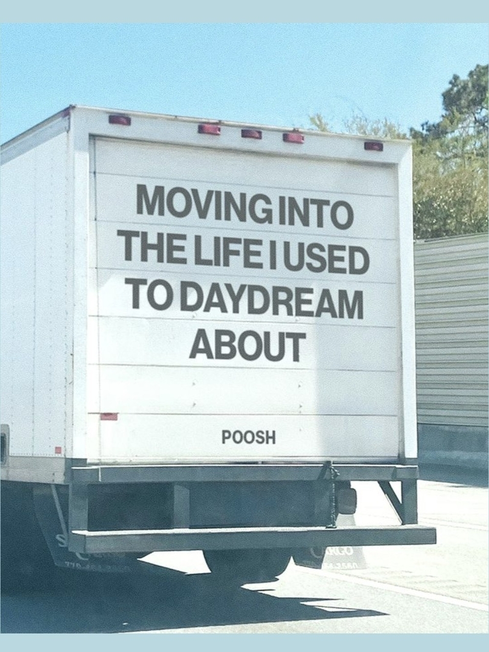 White Box Truck with Bold Black Text - 'Moving Into The Life'